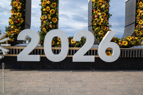 2026 number with flowers outdoors, symbolising celebration, new year concept