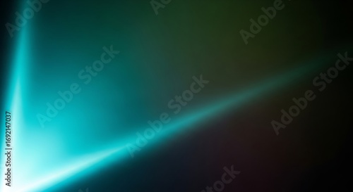 Abstract Teal Light Beams on a Dark Gradient Background