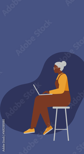 Elderly African American woman sitting on a stool, intently using a laptop. Represents modern seniors embracing technology, learning, and digital connectivity.