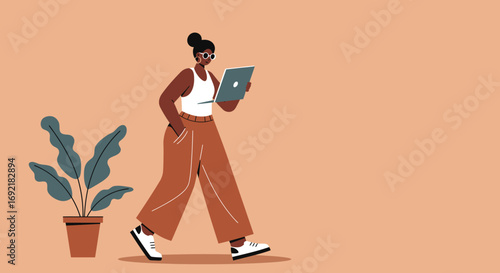 Confident Black woman walks while focused on her laptop, embodying modern remote work, digital lifestyle, and mobile productivity. Ideal for business and technology themes.
