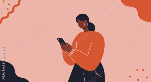 Modern Black woman using her smartphone for communication or social media against a simple, trendy background.