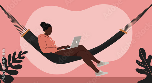 African American woman working remotely on laptop while relaxing in a hammock, embodying modern work-life balance and freedom.