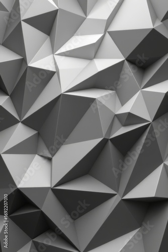 The image features a geometric pattern composed of numerous three dimensional triangular facets arranged in a seemingly random, yet coherent design