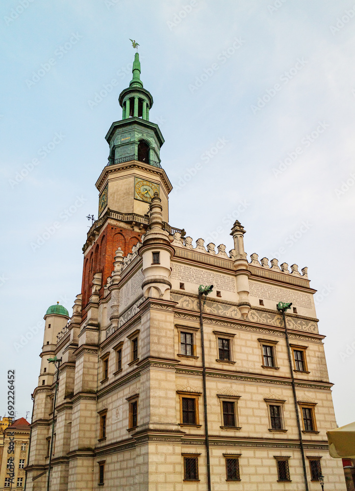Fototapeta premium View of the Town Hall building on the main square in the old town of Poznan, Poland. Architecture of the historic city.