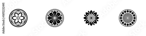 Set of four traditional Japanese Kamon family crests with floral motifs, black and white circular emblems isolated on a white background