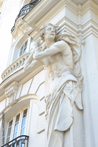 Exterior of historical building with caryatid