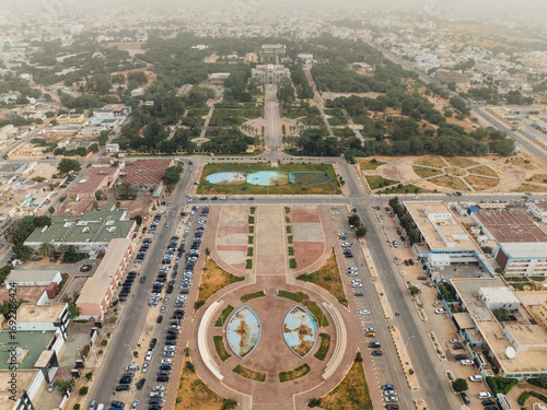 Aerial view of meticulously designed gardens and grand governmental buildings stretching towards the horizon, Ksar, Nouakchott, Mauritania.