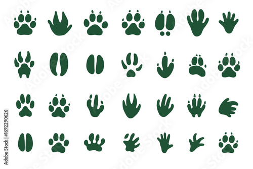 Collection of animal paw and hoof print icons including dog, cat, bird, deer, and reptile tracks in silhouette style on dark green background