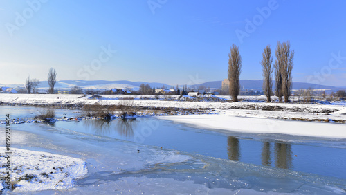 The Mures River with its banks frozen by low temperatures.