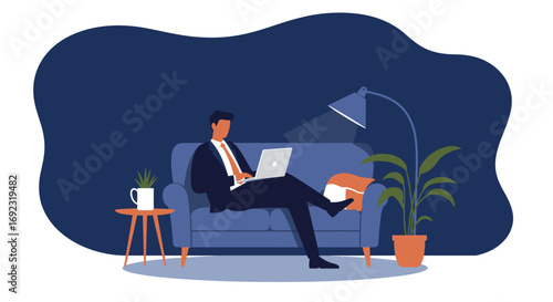 Professional man in a suit working on a laptop from a comfortable sofa at home, symbolizing remote work, productivity, and modern lifestyle.