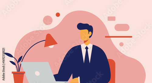 A professional man in a suit works diligently on his laptop at a modern desk with a lamp and plant. Ideal for business, remote work, or corporate concepts.