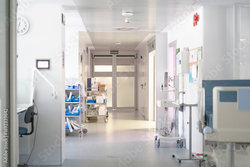 Fotografie Empty hospital corridor with medical equipment and supplies