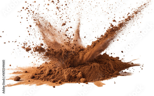 Explosive burst of cocoa powder creating dramatic motion splash against black backdrop texture