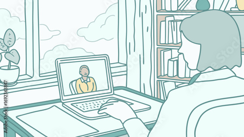 Person having a video call at a desk near window