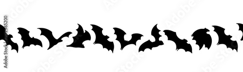 Black vampire bats in seamless horizontal border, isolated on white. Ideal for Halloween party decor, spooky web headers, mailing lists, and creepy seasonal graphic design projects