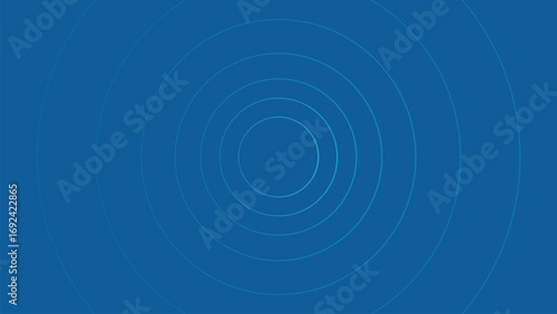 A simple blue background with concentric circles emanating from the center of the right side of image