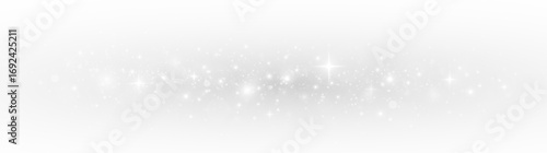 Dust christmas glow with radiant light and silver stardust spray. Sparkle particles and glittering texture, festive glamour, luminous holiday atmosphere.