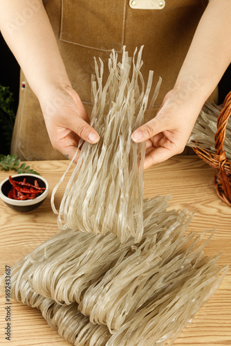 Bild auf Leinwand Making Handmade Sweet Potato Vermicelli Noodles Traditional Asian Food Preparati