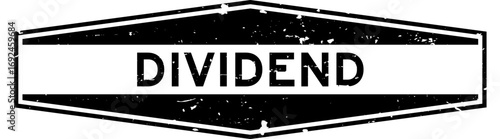 Grunge black dividend word hexagon rubber seal stamp on white background