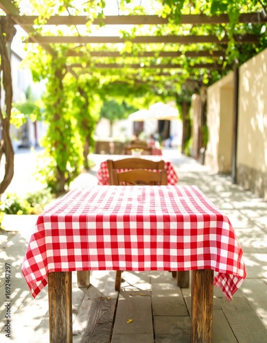 Outdoor cafe tables under trellis