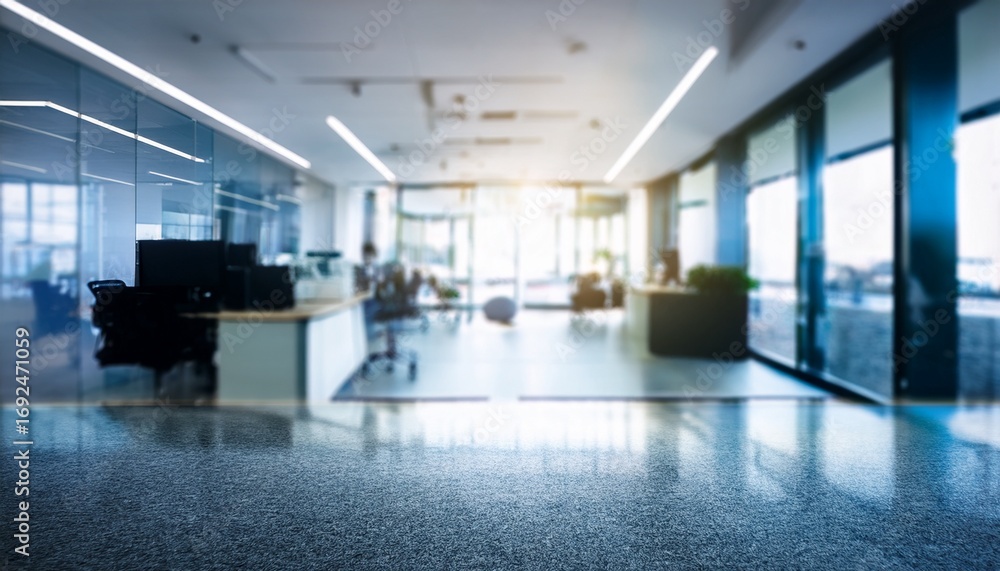 Fototapeta premium blurred empty open space office design background with abstract light bokeh at office interior