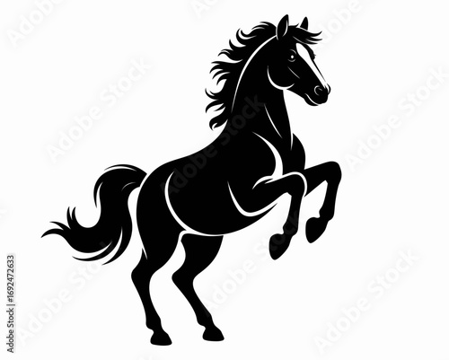 A majestic black horse rearing up on its hind legs with a white stripe on its face and flowing mane and tail silhouette