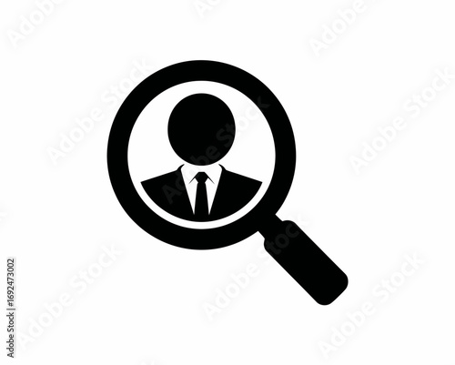 A black and white illustration of a person in a suit under a magnifying glass icon design element silhouette