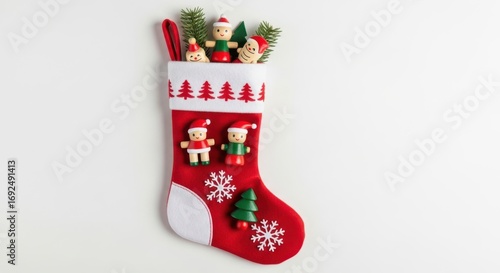 Festive christmas stocking isolated on white background filled with toys