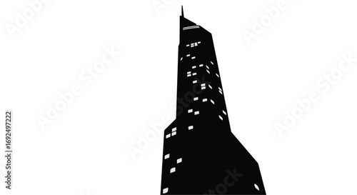 Sleek modern skyscraper with illuminated windows against a white background