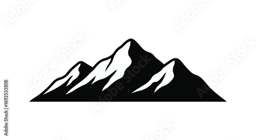 Majestic mountain peaks under a bright sky, symbolizing adventure and nature's grandeur.