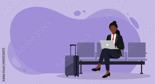Professional Black woman works on laptop while waiting in an airport lounge with luggage. Depicts business travel, remote work, and productivity on the go.