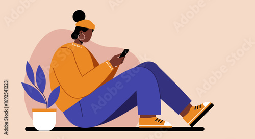 Young woman sitting casually, absorbed in her smartphone, connecting digitally. Represents modern communication, social media, and relaxation.