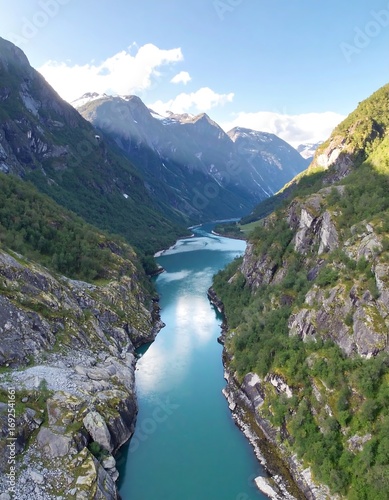 Serene fjord winding through dramatic mountains
