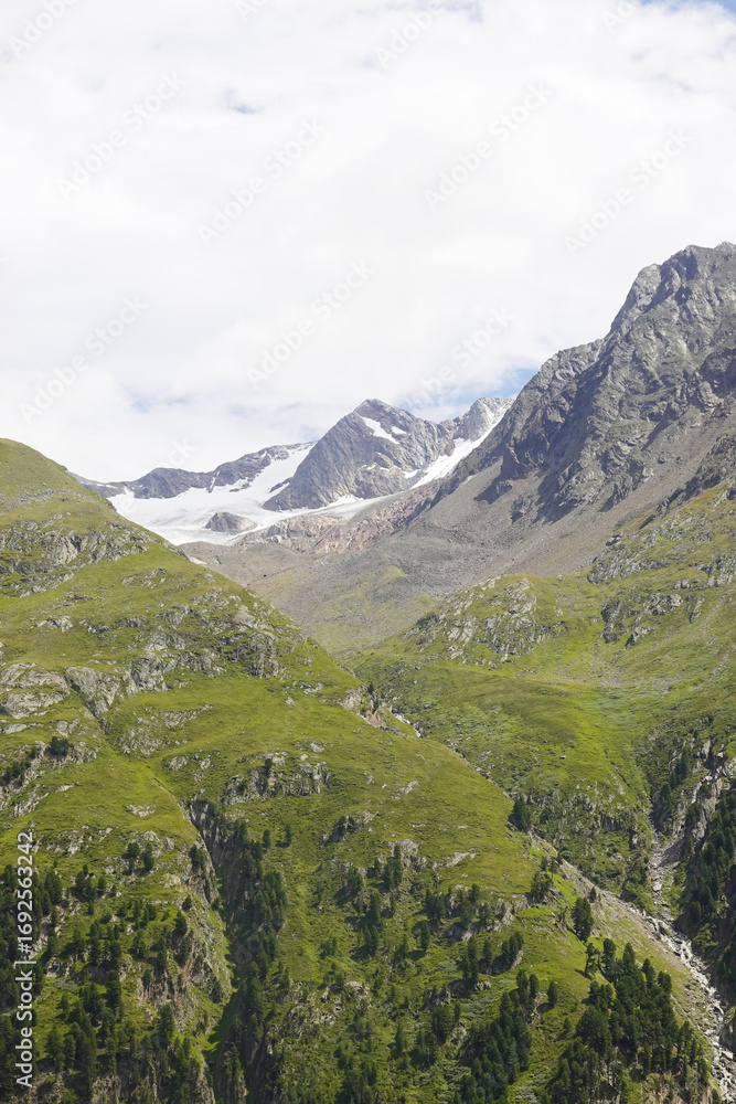 Fototapeta premium The view opening from the high hiking way from Tiefenbach glacier to Vent in Oetztal valley in the Austrian Alps 
