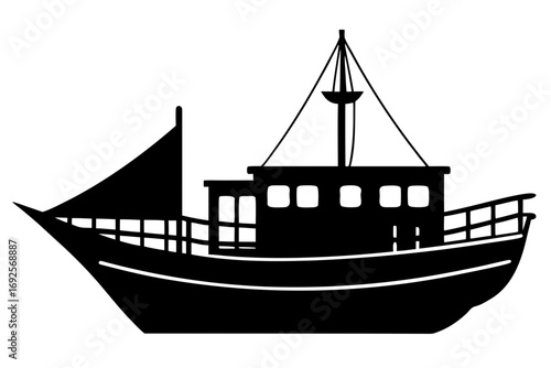 Silhouette of a fishing boat with sails and a cabin