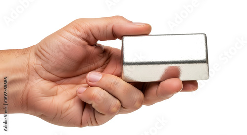 a hand holds a silver ingot symbol of wealth, success, and investment, isolated on transparent background