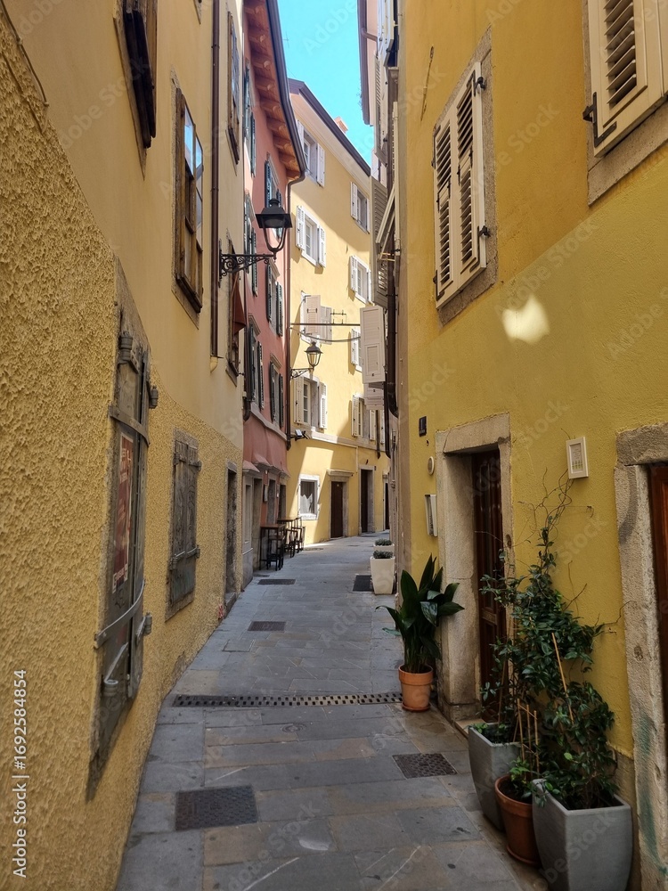 Fototapeta premium Piran, Slovenia – Mediterranean Streets and Boats by the Sea