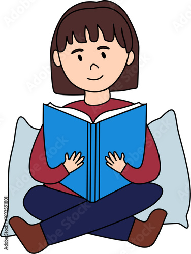 Menina lendo um livro em cima de um travesseiro