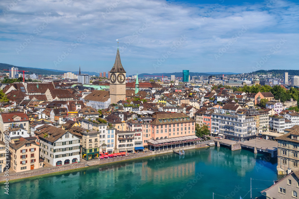 Naklejka premium Zurich, Switzerland. Aerial cityscape with St. Peter church and Limmat river