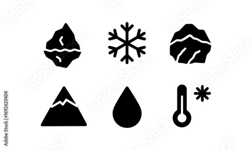 Monochrome winter symbols: snowflake, ice, and mountain icons