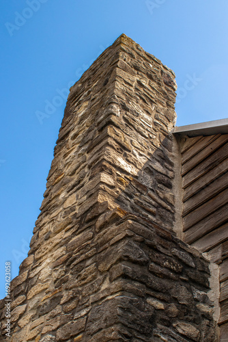 Wallpaper Mural stone chimney on farmhouse looking upward toward the sky Torontodigital.ca