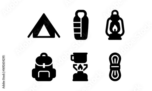 Essential outdoor camping icons set in bold silhouette style