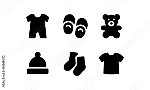 Silhouette icons of baby clothing and accessories for nursery decoration