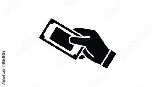 Hand holding a credit card for payment or transaction illustration