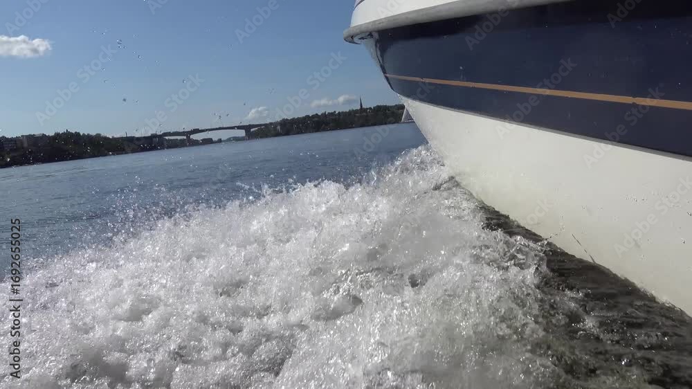 Stockholm, Sweden The wake and splash of a fast motorboat moving through the water.  