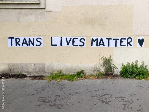 Trans Live Matter protest poster stuck on a wall