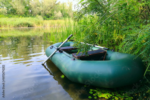 inflatable fishing boat with oars
