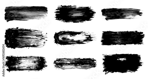 Set of monochrome brushstrokes in black and white