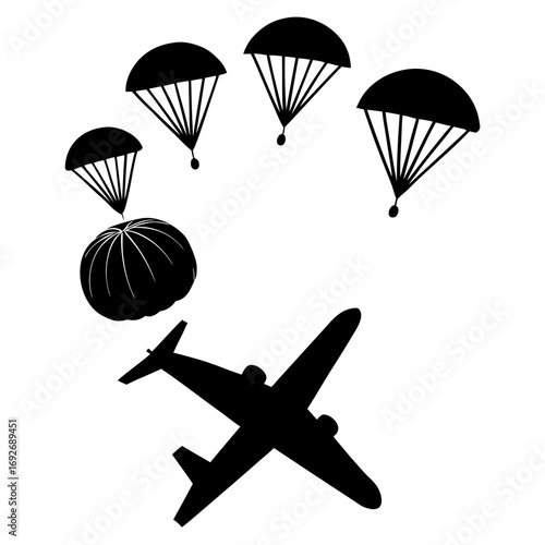 Airplane dropping parachutes and cargo