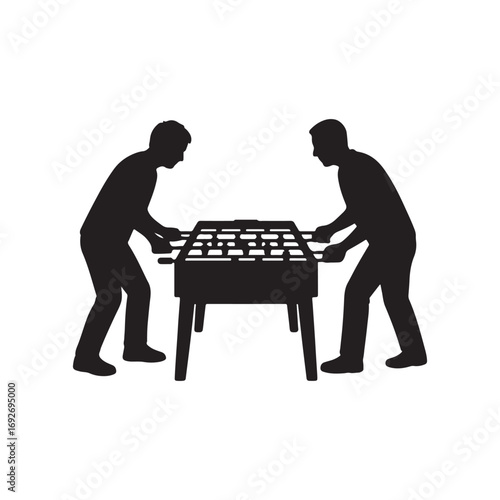 two men playing table football